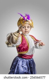 Child In Sultan Costume With Lamp
