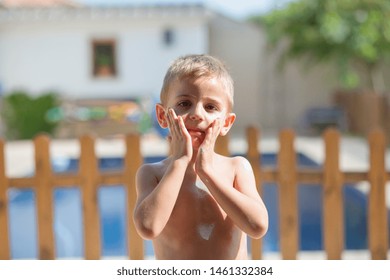 child with sunscreen before bathing