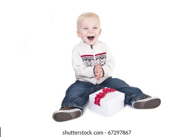 Child Super Excited About Opening His New Present