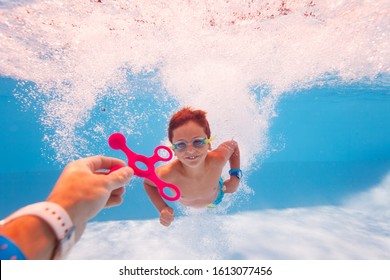 Child Swim Dive Underwater Take Toy From Teacher