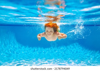 Child Swim Under Water In Sea. Kid Swimming In Pool Underwater. Happy Boy Swims In Sea Underwater, Active Kid Swimming, Playing And Diving, Children Water Sport.