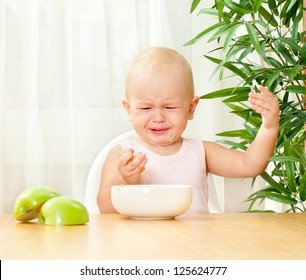 Child At The Table Does Not Want To Eat