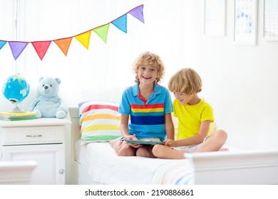 Child With Tablet Computer. Kids Study Online. Bedroom For Two Siblings. Electronic Device For Learning And Studying At Home. Little Boy With Laptop Pc. Gadget Screen Time For Children. Kid At Home. 