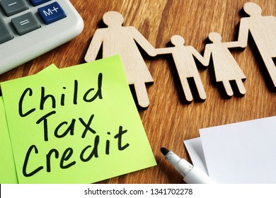 Child Tax Credit Ctc Concept. Wooden Figures Of Family And Calculator.