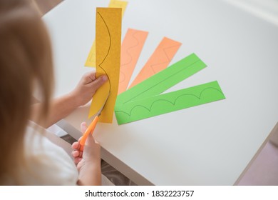 Child Teaching Scissors Skills , Cutting Lines, Home Education Concept.