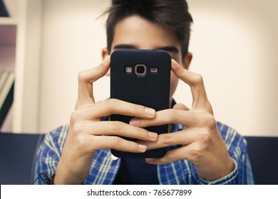 Child, Teenager Or Preteen With Mobile Phone At Home