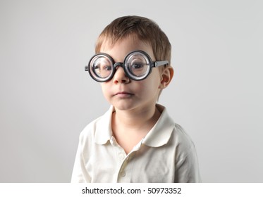 Child With Thick Glasses