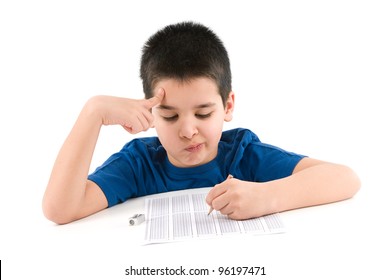 Child Thinking To Answer Test Score Sheet.