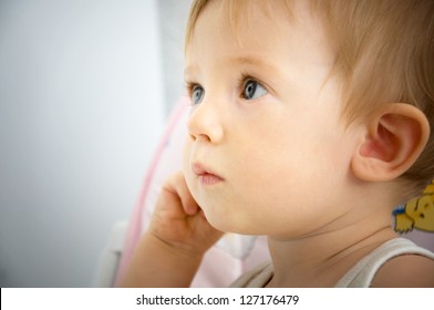 child thinks - Shutterstock ID 127176479