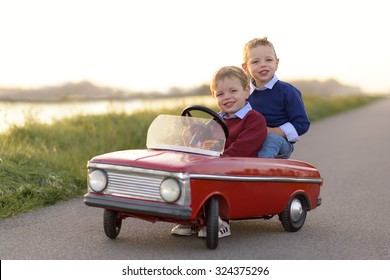 child together with his cabriolet