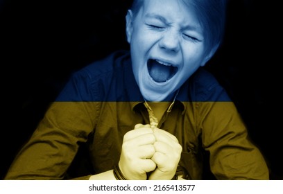 A Child Tonned With The Flag Of Ukraine Is Crying. Sadness Longing Hope. Tear Macro. Children's Tears From The War. Evacuation Of Civilians. Freedom To Ukraine. Hostage