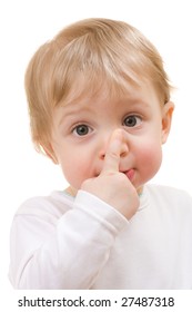 Child Touching Her Nose - Portrait Isolated On White