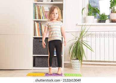 The Child Trains At Home: Fitness, Yoga, Exercises. Distant Training With Personal Trainer, Social Distance, Online Education Concept. Physical And Mental Health Trend