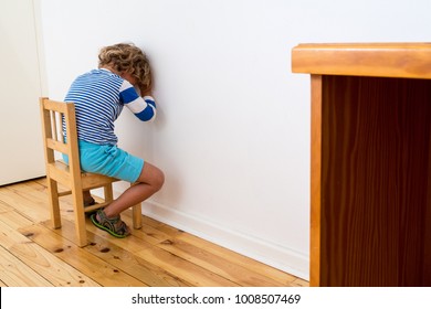 Child In Trouble.

A Young Boy Being Disciplined.