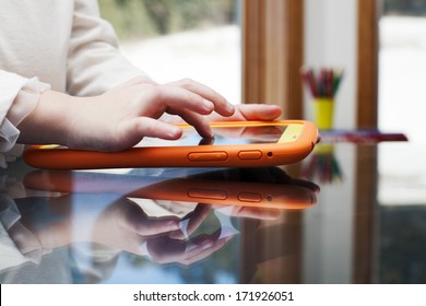 Child Uses A Tablet PC