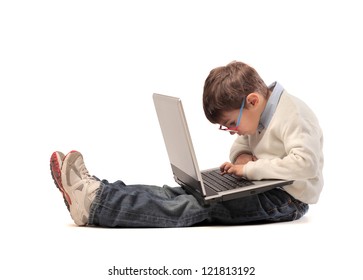 Child Using A Laptop Computer