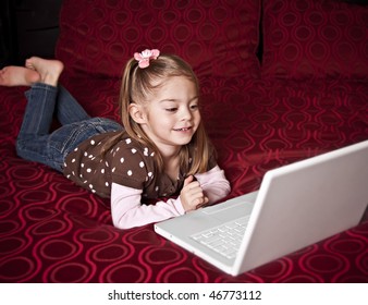 Child using a laptop computer