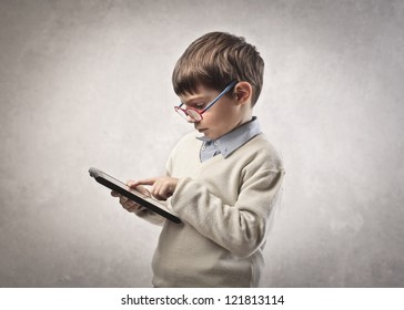 Child Using A Tablet PC