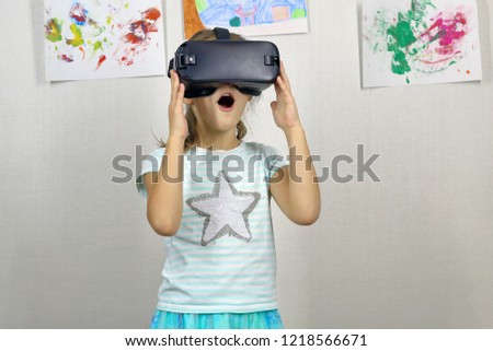 
child and virtual reality glasses