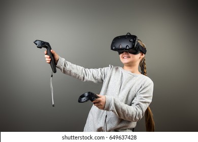 Child With Virtual Reality Headset And Joystick