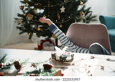 Child wake up waiting for Christmas gifts on Christmas morning