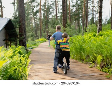 Child Walking On The Glamping Territory