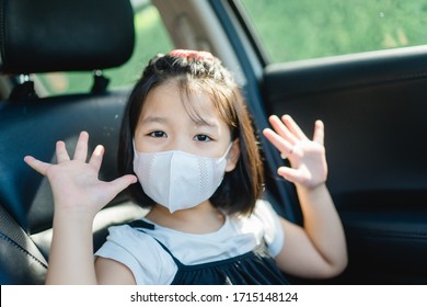 Child Washing Hands And Showing Clean Hands In The Car.Hand Foot And Mouth Disease In Child Concept.Coronavirus Covid-19 And Air Pollution Pm2.5 Concept.Little Chinese Girl Wearing Mask In Car.