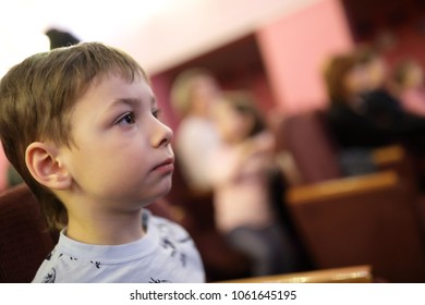 Child Watching Theatrical Performance In The Theater