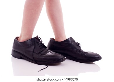 Child Wearing Adult Shoes