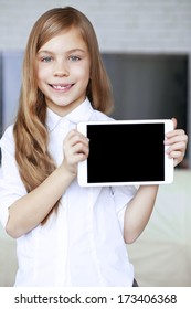 Child Wearing Formal Wear Holding Ipad