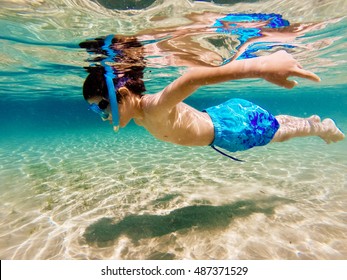 Child Wearing Snorkeling Mask Diving Underwater