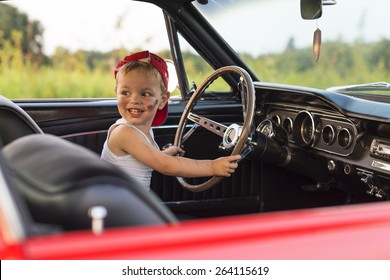child at the wheel