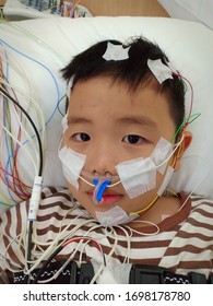 A Child Who Is Undergoing A Sleep Measurement Using A Medical Device At Chula Hospital, Bangkok, Thailand, On 27 November 2018