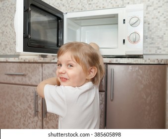 Child Without Supervision Parents Playing Microwave Stock Photo ...