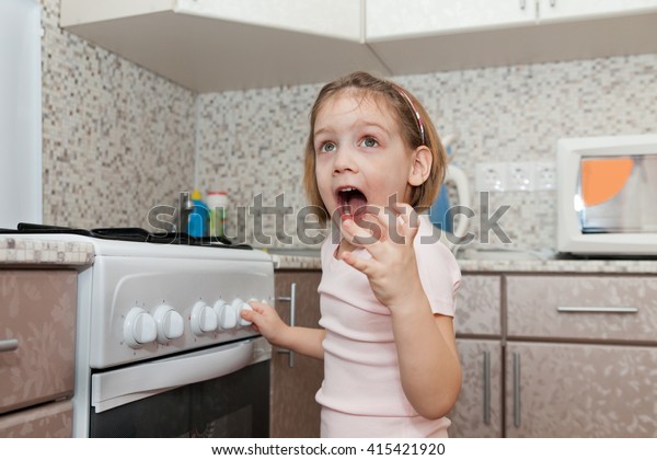 Child Without Supervision Parents Playing Stove Stock Photo 415421920 ...