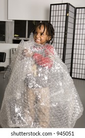 Child Wrapped In Bubble Wrap Packaging