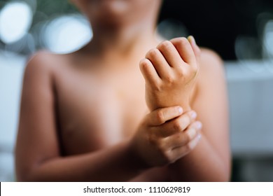 Child With Wrist Pain, Health Care Concept