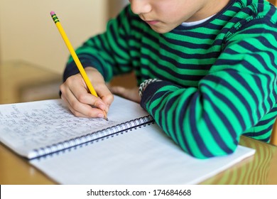 A Child Writing Cursive