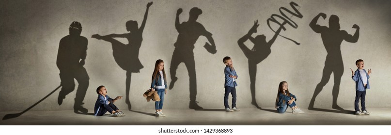 Childhood and dream about big and famous future. Conceptual image with boy and girl and shadows of fit athlete, hockey player, bodybuilder, ballerina. Creative collage made of 2 models. - Shutterstock ID 1429368893