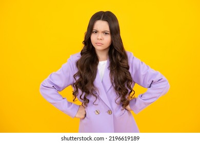 Childhood Emotion Anger And Hate. Teenager Girl Frowning Upset Because Of Problem. Mad Young Girl Isolated In Studio Background. Furious Child.