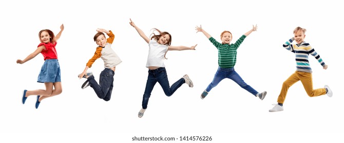 childhood  fun   motion concept    happy children jumping over white background