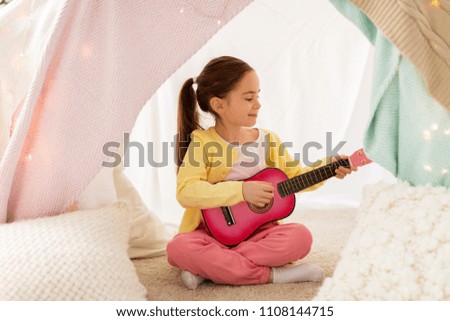 Similar – Image, Stock Photo Little girl playing in a home playground