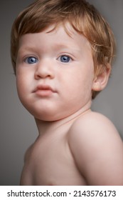 Childhood Innocence. Cropped Head And Shoulders Portrait Of A Cute Little Toddler.