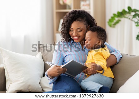 Similar – Image, Stock Photo Mother and toddler with mobile phone in hand