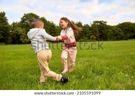 Image, Stock Photo Two little kids holding her hands on a summer day