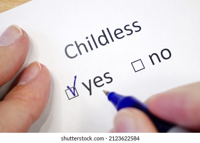 Childless - Yes, No. The Answer Is In The Test With A Checkbox. Pen On A White Sheet Of Paper. Closeup