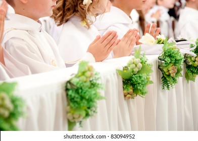 Children Accepting The First Holy Communion