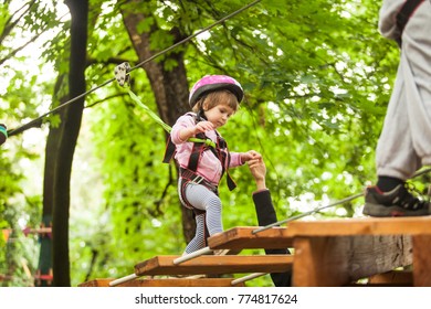 Children in a adventure playground - Powered by Shutterstock