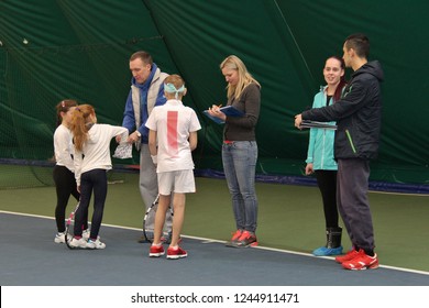 Children, Along With The Tennis Coach, Play And Train Tennis. Tver, Russia - 2016