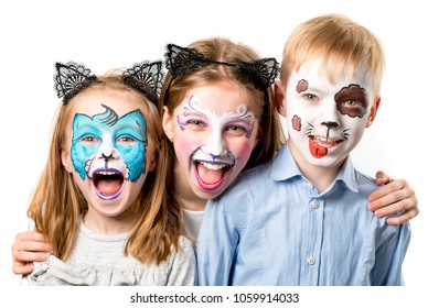 Children with animal face paintings isolated